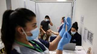 Global COVID-19 caseload tops 126.6 million