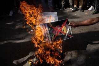 Myanmar asks India to return eight police who fled across border