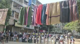 Protesters string up women's clothes for protection in Myanmar 