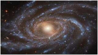 What is the centre of our galaxy, a supermassive black hole or a massive amount of dark matter?