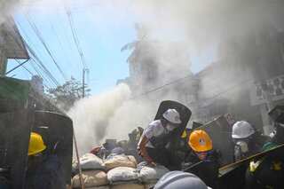 Myanmar anti-coup protesters 'barricaded' in buildings allowed to leave Yangon