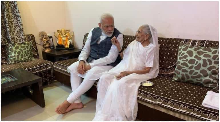 India PM Narendra Modi's mother receives coronavirus vaccine India PM Narendra Modi's mother receives coronavirus vaccine