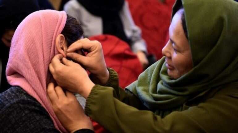 Afghanistan releases, then redacts memo banning girls from singing. #IAmMySong roars on Twitter