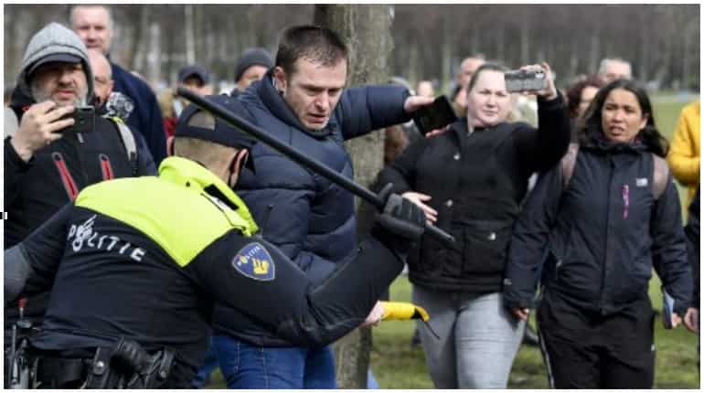 Dutch police clear anti-government protest on election eve
