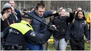 Dutch police clear anti-government protest on election eve