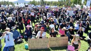 Thousands rally at Australia's parliament to demand justice for sexual assault victims