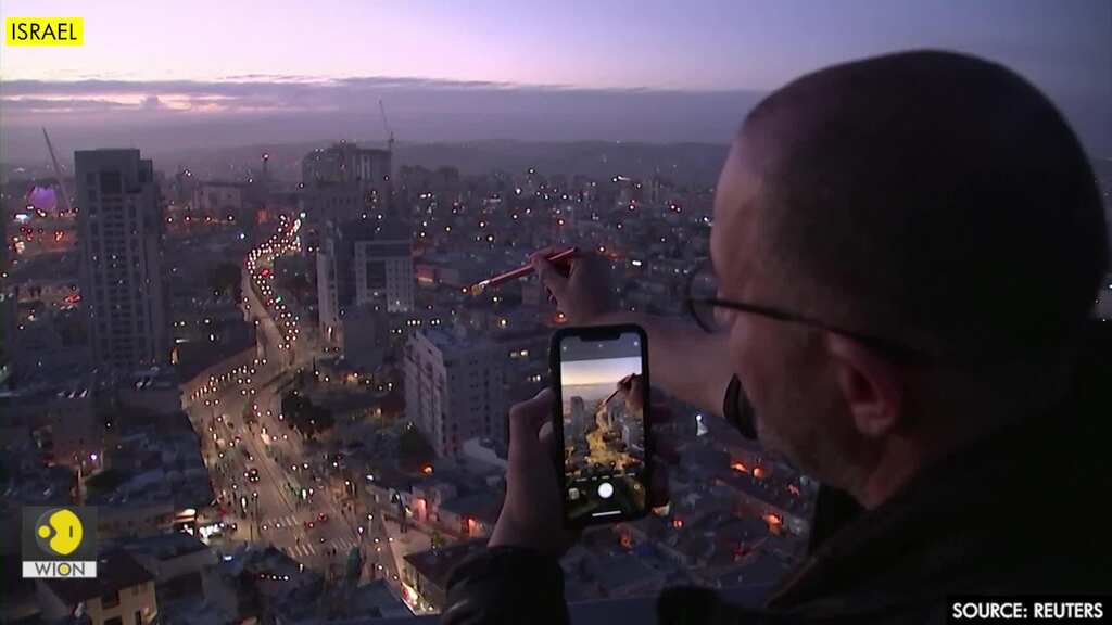 Brush with death inspires Israeli artist's surreal cellphone snaps