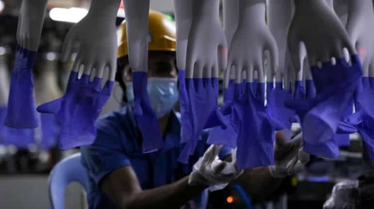 Malaysia charges Top Glove over quality of worker housing Malaysia charges Top Glove over quality of worker housing
