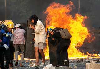 Yangon residents flee amid martial law as food crisis looms in Myanmar