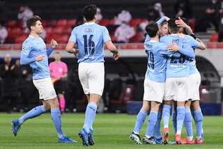 Man City cruise into Champions League quarter-finals