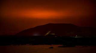Volcano erupts near Icelandic capital, ending a streak of earthquakes