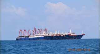 Philippines spots hundreds of Chinese 'militia' boats near disputed reef