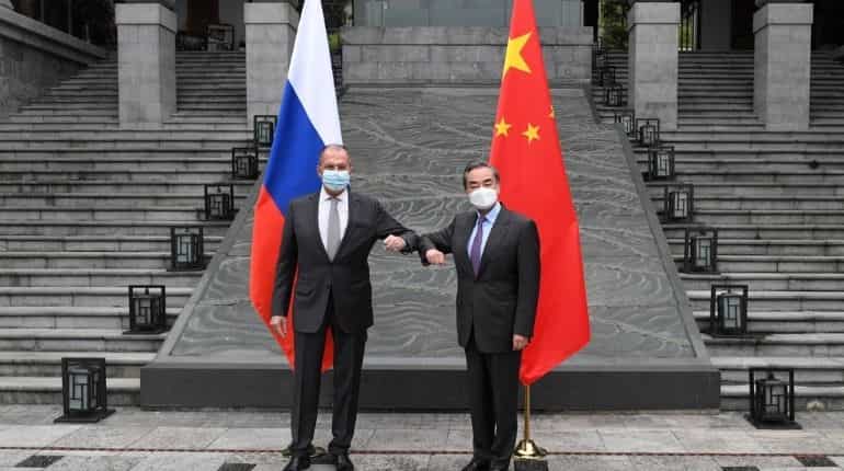 Russia's foreign minister meets Chinese counterpart to cement ties against US firm policy push