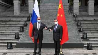 Russia's foreign minister meets Chinese counterpart to cement ties against US firm policy push