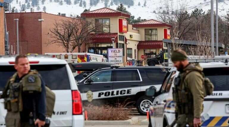 Suspect in Colorado store shooting is charged with 10 counts of murder