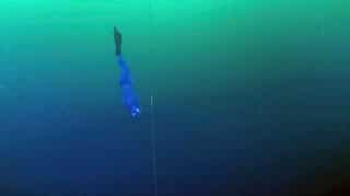 The deepest diver in the history of free diving goes below the ice