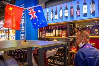 Australia threatens WTO action as China hikes duty on wine