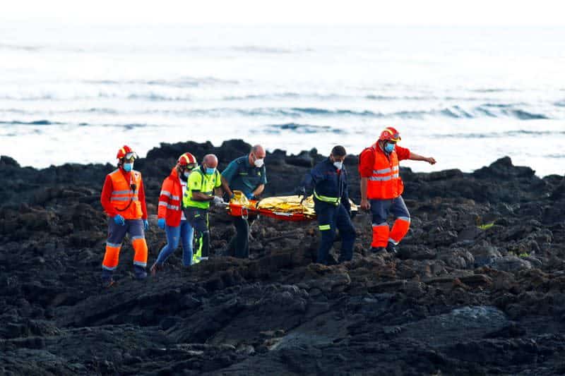 Three die, dozens rescued as migrant boat capsizes off Spain's Tenerife Three die, dozens rescued as migrant boat capsizes off Spain's Tenerife