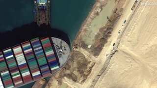 Ship blocking Suez Canal moves slightly, unclear when it will refloat