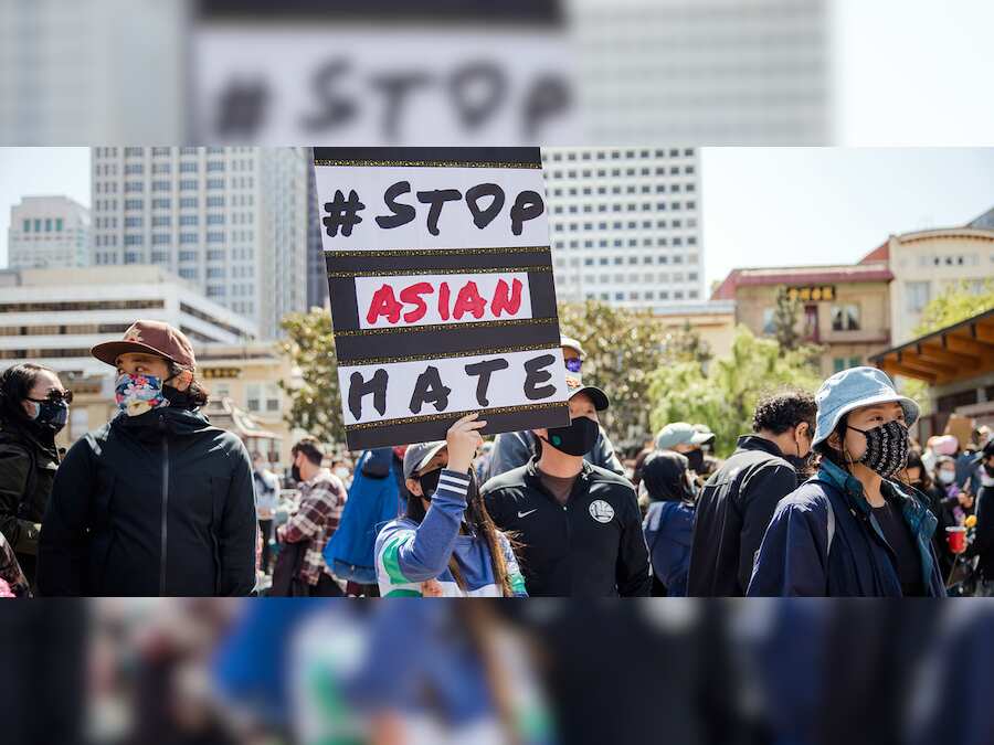 United States: Protestors march in support of Asian American Community