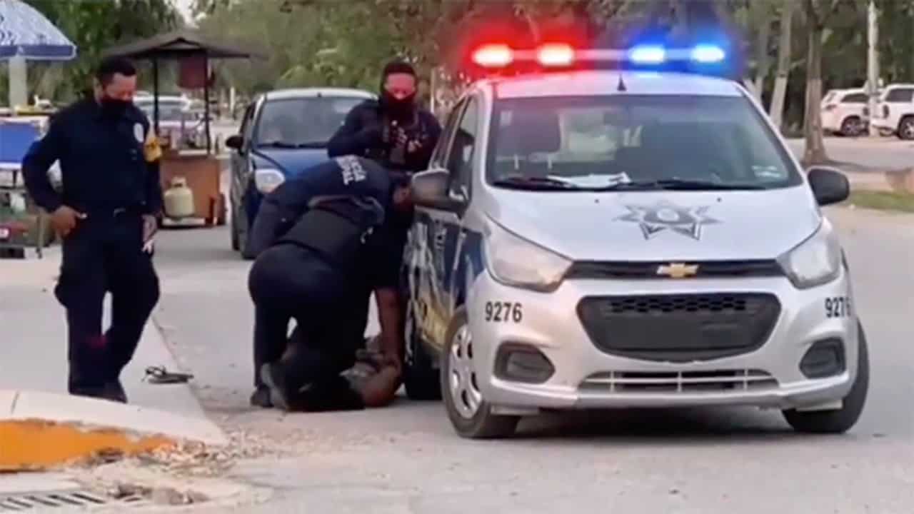Mexico opens probe into death of woman shown pinned to ground by police Mexico opens probe into death of woman shown pinned to ground by police