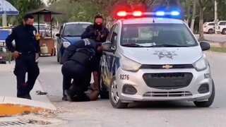 Mexico opens probe into death of woman shown pinned to ground by police