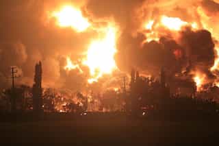 Five injured, hundreds evacuated after fire at Indonesia oil refinery