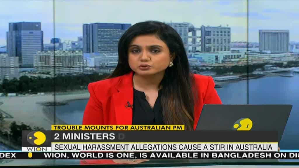 Australian PM Scott Morrison demotes two ministers