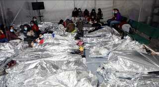 ‘No place for a child’: Inside the tent camp housing thousands of migrant children
