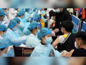 Global officials urge rich countries to donate excess COVID-19 vaccines, money to help end the pandemic
