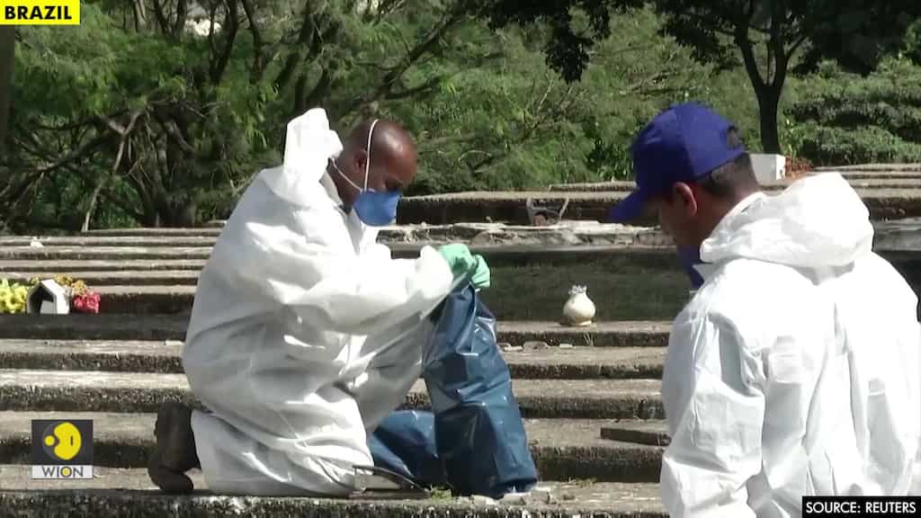 Sao Paulo exhumes old graves to make space for surging COVID-19 burials