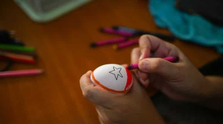 Art for freedom: Myanmar locals decorate Easter eggs with ...