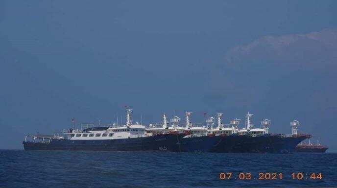 China drills in the disputed South China Sea as US naval patrol grows