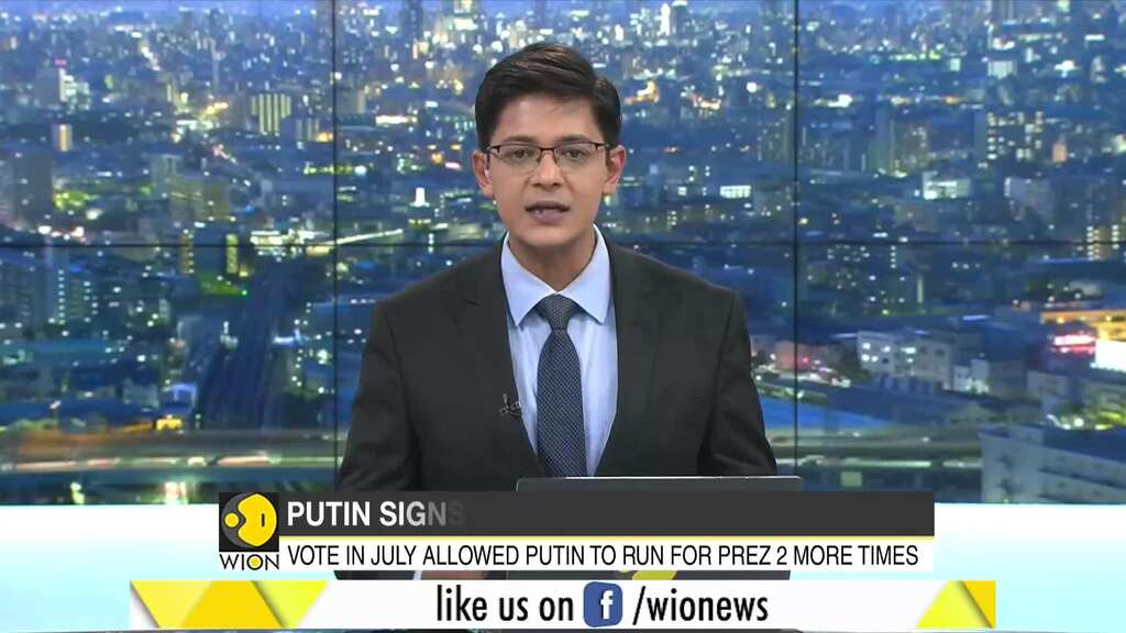 Putin signs law allowing him to hold power until 2036