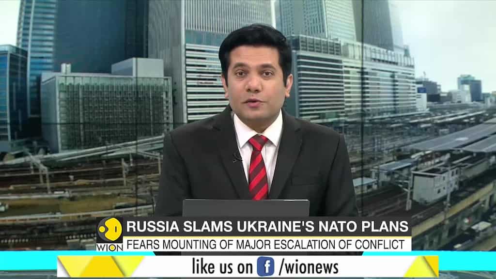 Ukraine urges NATO to set up membership path as Russian troops massing on its border