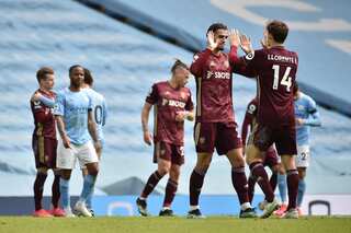 Dallas double sees 10-man Leeds shock Man City