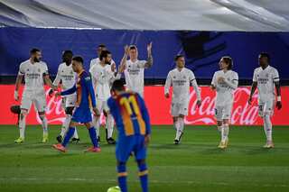 Real Madrid edge thrilling Clasico to go top of La Liga