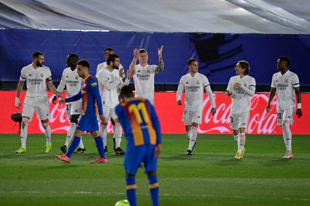 Real Madrid edge thrilling Clasico to go top of La Liga