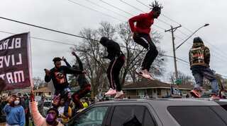 Protesters clash with police in US after Black man shot dead by cop