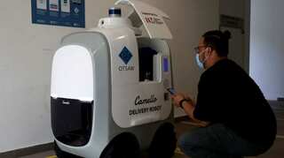 New normal? Robots being used for home deliveries due to surge in COVID cases