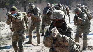Women join Ukraine's army in huge numbers as Russian threat looms