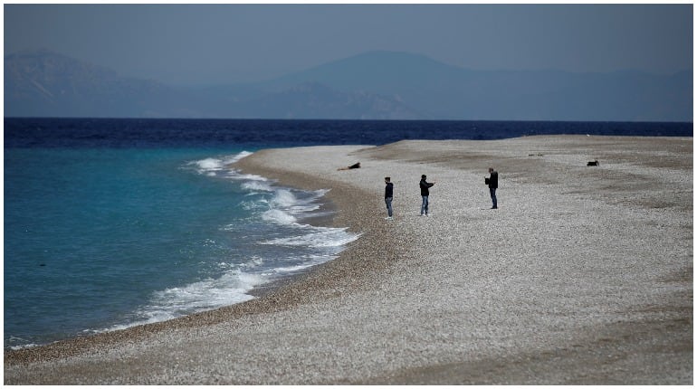 Greece opens to tourists, anxious to move on from pandemic crisis season Greece opens to tourists, anxious to move on from pandemic crisis season