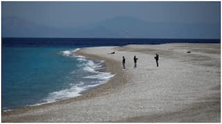 Greece opens to tourists, anxious to move on from pandemic crisis season