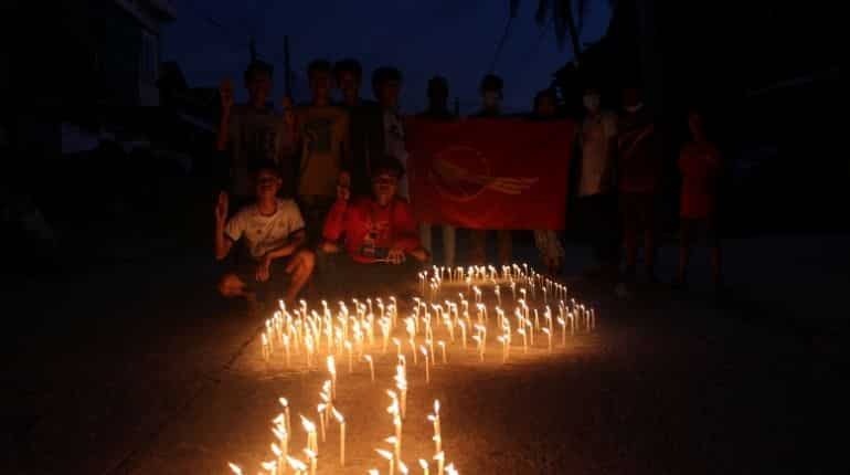Myanmar activists hold 'blue shirt' protests; report says junta chief to attend summit