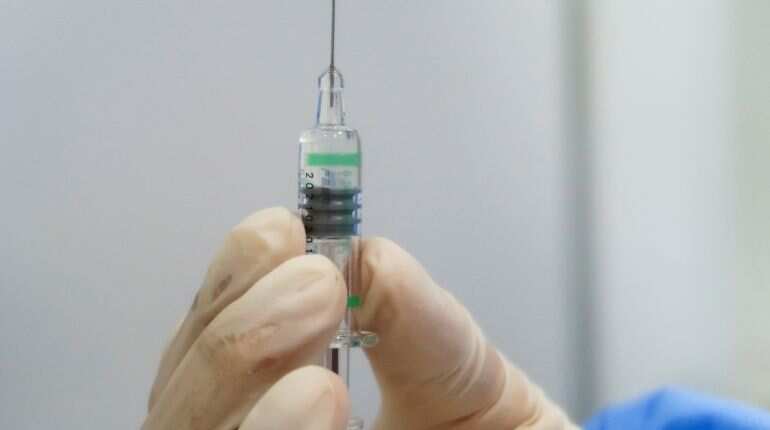 Some parts of China battle tight supply of COVID-19 vaccines