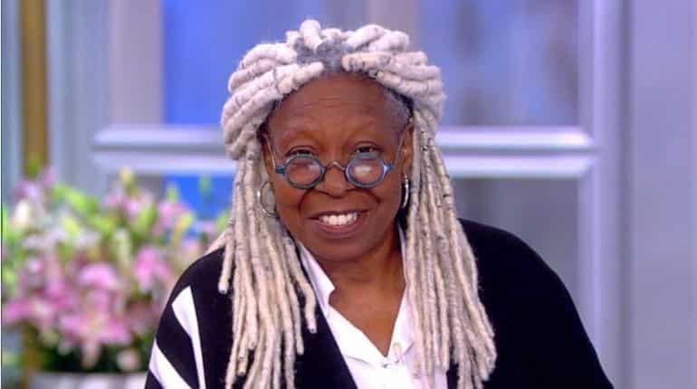 Whoopi Goldberg is writing a superhero script with an old Black woman