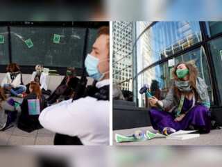 Extinction Rebellion activists smash HSBC bank windows in London’s Canary Warf