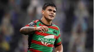 Two men charged over alleged online racial abuse of NRL player Latrell Mitchell