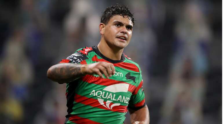 Two men charged over alleged online racial abuse of NRL player Latrell Mitchell
