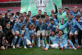Man City outclass Tottenham to retain League Cup in front of 8,000 fans